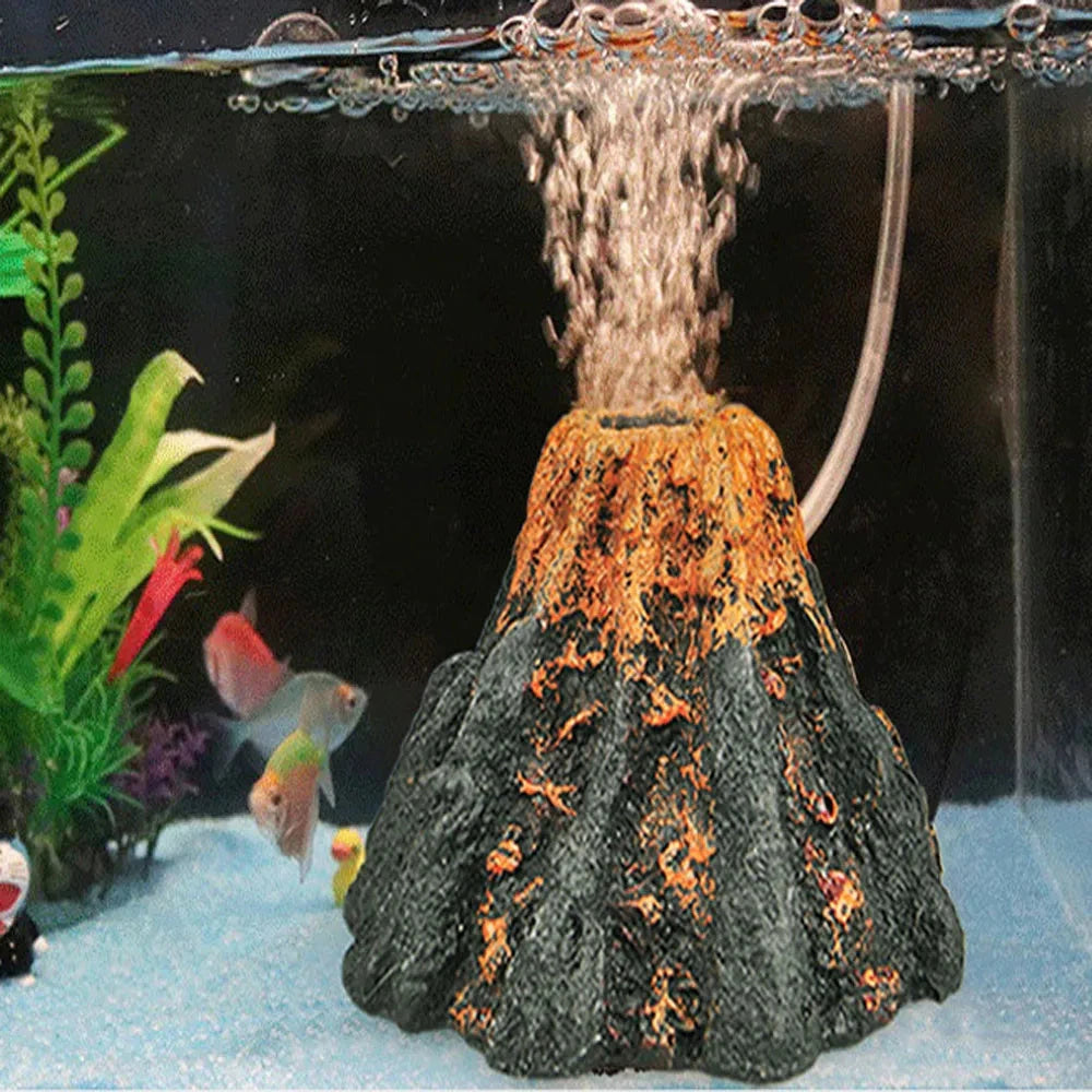 Volcán decorativo con la piedra difusora soltando burbujas en el acuario