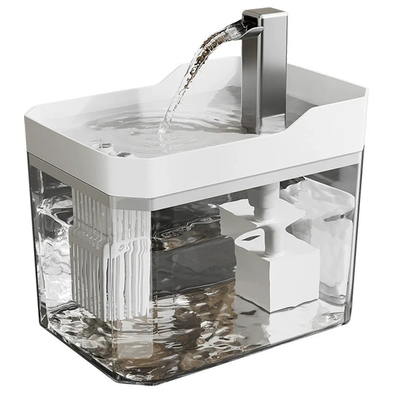 Fuente de agua para gatos tipo grifo en blanco, con el chorro cayendo sobre la bandeja