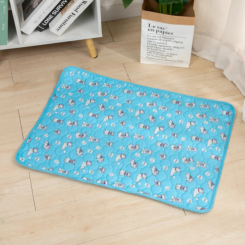 Empapador lavable turquesa con estampado de huellas