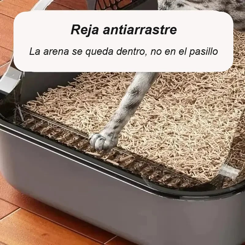 Reja antiarrastre en la entrada del arenero: la arena se queda dentro, no en el pasillo
