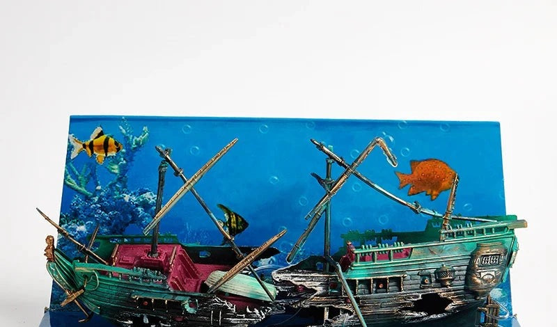 Barco hundido decorativo para acuario, con el fondo marino de colores