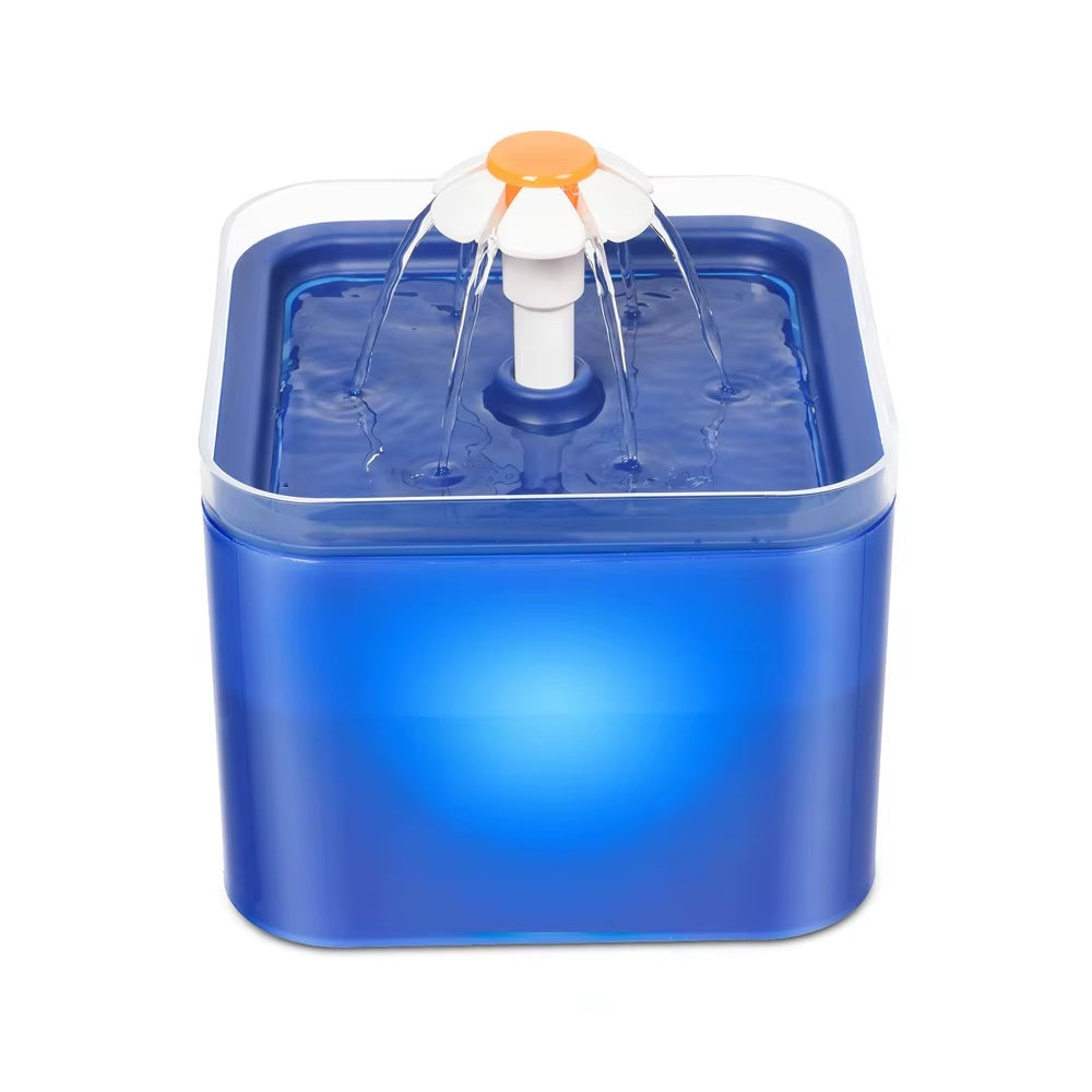 La fuente azul con la luz LED encendida dentro del deposito